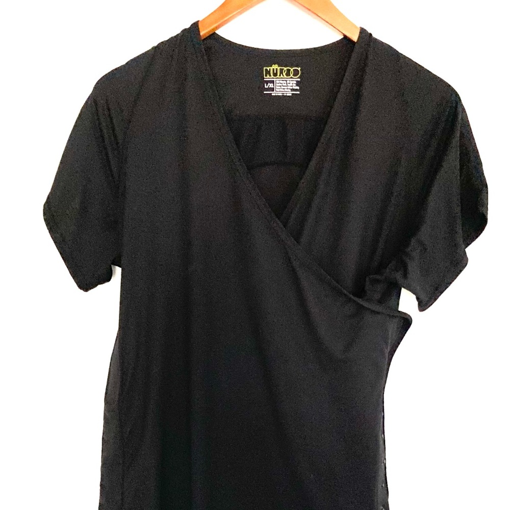 Nuroo baby wearing shirt L/XL